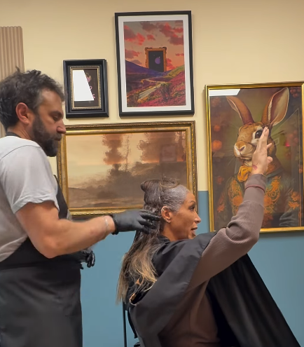 Fabio styling a client's hair